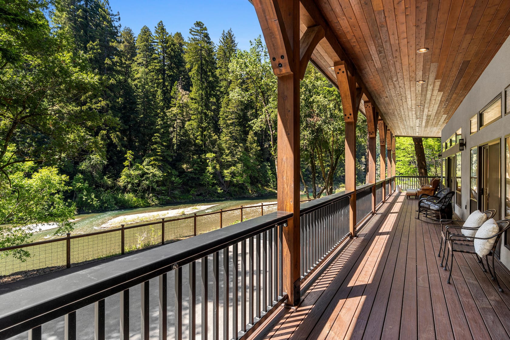 Covered timber-frame deck above the river